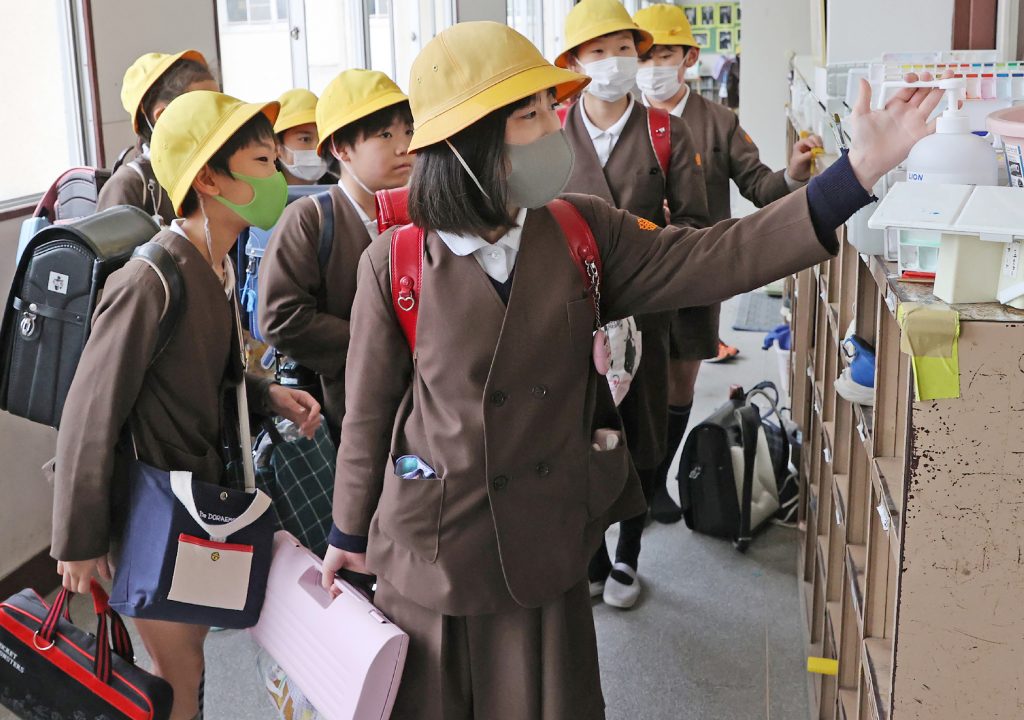 Infections from the virus in Japan have topped 200, with five deaths - including one on Friday of a man in his seventies. (AFP)