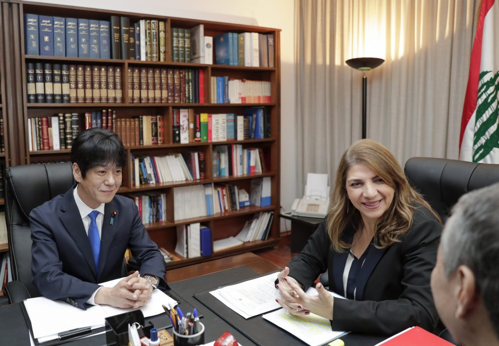 Lebanese Justice Minister Marie Claude Najm meets with Japan's deputy Justice Minister Hiroyuki Yoshiie (L) in the capital Beirut, on March 2, 2020, to discuss the case of former Nissan Chairman Carlos Ghosn, currently a fugitive in his native Lebanon. (AFP)