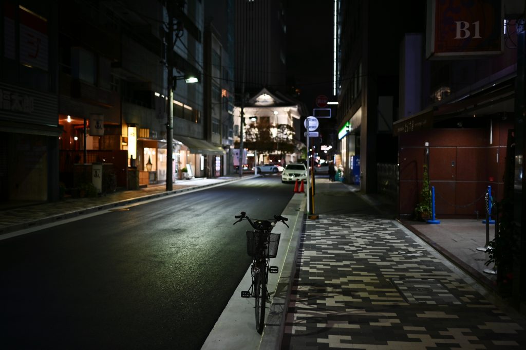 This picture taken on March 15, 2020 shows an empty street in Tokyo's Ginza area as fewer people remain out at night due to precautions against the spread of the COVID-19 coronavirus outbreak around the world. (AFP)