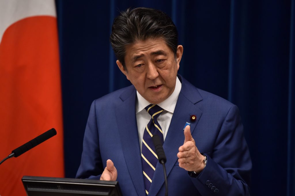 Japan's Prime Minister Shinzo Abe delivers a speech during a press conference at the prime minister's office in Tokyo on March 28, 2020. (AFP)