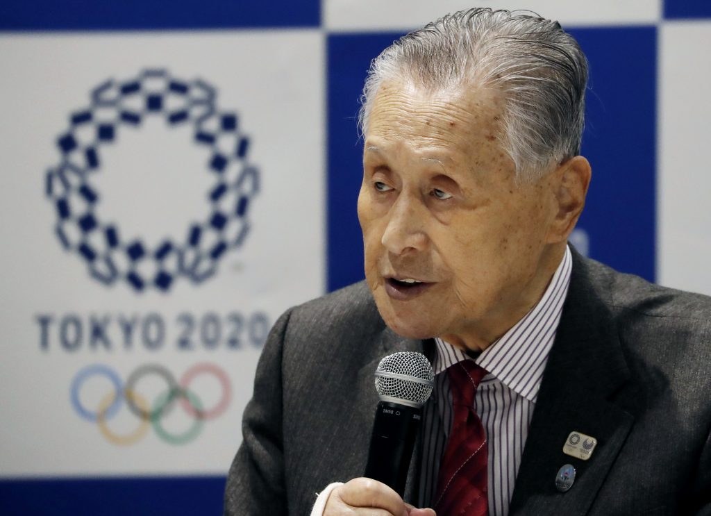 Tokyo 2020 Organizing Committee President Yoshiro Mori delivers a speech during the Tokyo 2020 Executive Board Meeting in Tokyo, Japan Monday, March 30, 2020. Mori said Monday he expects to talk with IOC President Thomas Bach this week about rescheduling the games for next year. (Issei Kato/Pool Photo via AP)