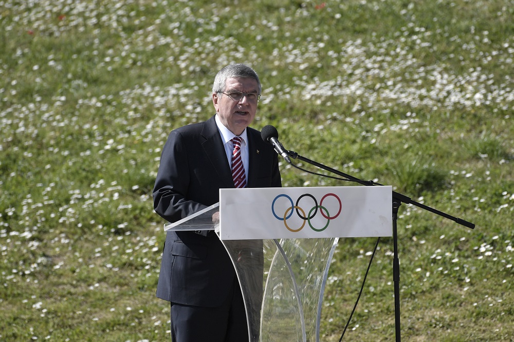 International Olympic Committee (IOC) President Thomas Bach speaks during the Olympic flame lighting ceremony on March 12, 2020 in ancient Olympia, ahead of Tokyo 2020 Olympic Games. (AFP)