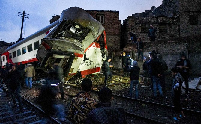 This picture taken on March 12, 2020 shows a view of the scene of a railroad collision in the Egyptian capital Cairo, where a train crashed into another which was stationary. (AFP)