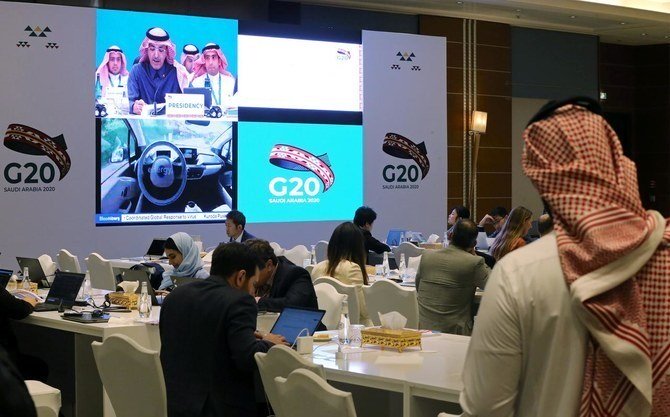 Journalists work in the media center during the meeting of G20 finance ministers and central bank governors in Riyadh, Saudi Arabia, February 22, 2020. (Reuters)