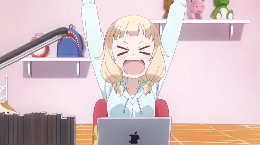 Anime characters behind a Macbook in Apple Japan’s