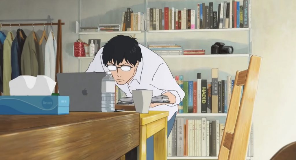 Anime characters behind a Macbook in Apple Japan’s 