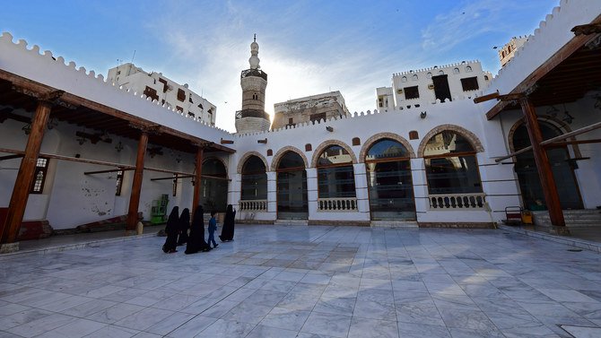 In this file photo, people walk inside the Shafei Historical mosque in Al-Balad, a historical area in the Saudi Arabian port city of Jeddah on Jan. 11, 2020. (AFP)
