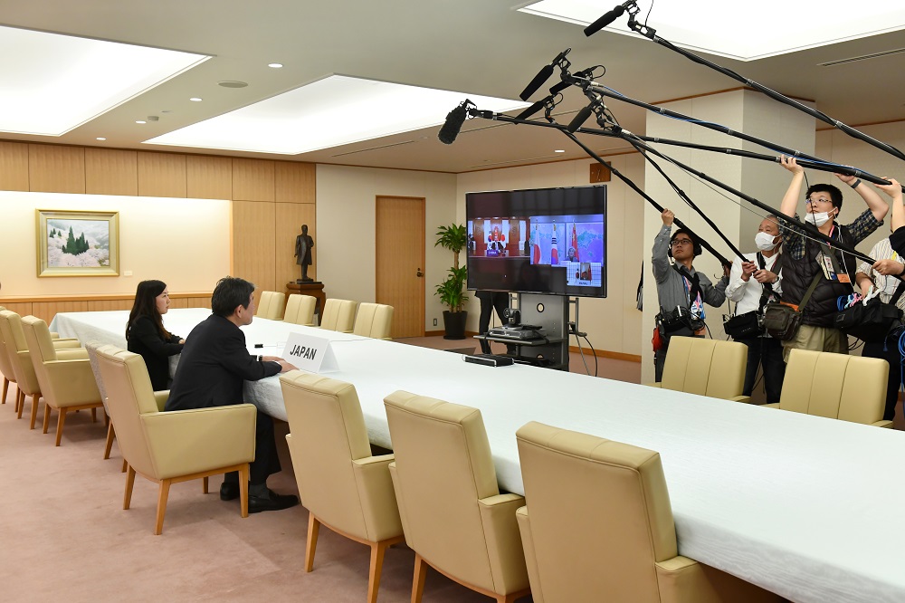 Japan's Foreign Minister Toshimitsu Motegi (2nd L) speaks during the Japan-China-South Korea Foreign Ministers' teleconference at the foreign ministry in Tokyo on March 20, 2020. (AFP)