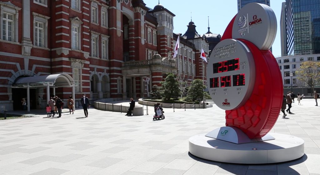 The hi-tech clock in Tokyo Station square displays the date and time, but had been showing a countdown to the games scheduled for July 24 before the countdown was stopped Monday. (AN photo)