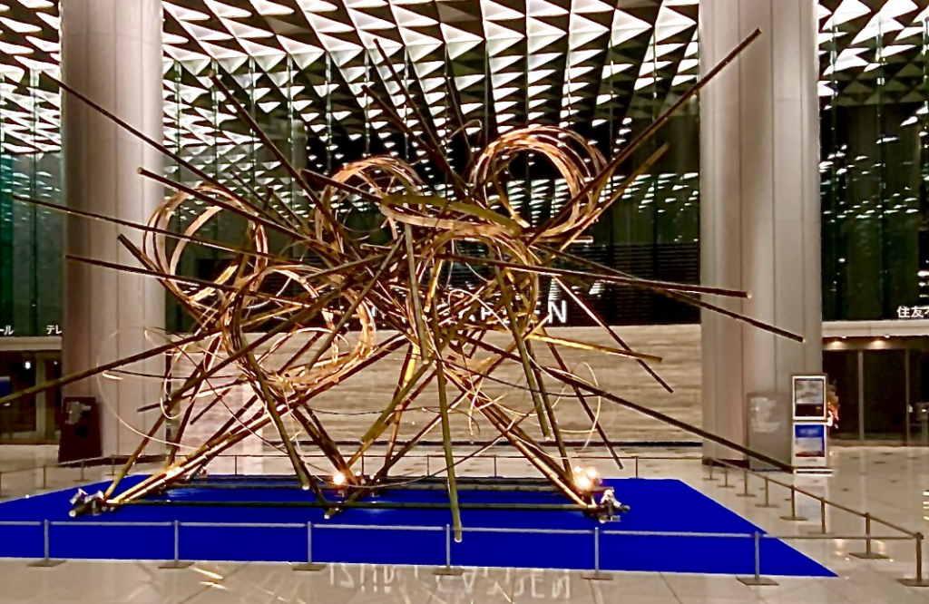 Olympic rings designed in Japanese traditional style using bamboo sticks and branches at the Roppongi Tower building lobby in central Tokyo (AN Photo)
