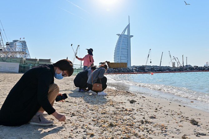 A spokeswoman from the Dubai Media Office said rumors suggesting the country’s airports would be closed to prevent the spread of COVID-19 were false. (AFP)