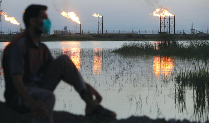 An oil field north of Basra, Iraq. The coronavirus has weighed on the global economy and depressed fuel demand. (Reuters)
