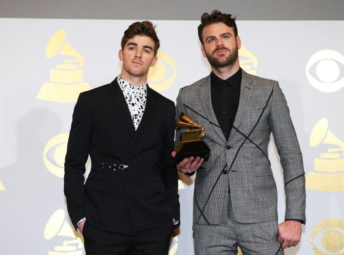 The Chainsmokers pose with the award they won for Best Dance Recording for “Don’t Let Me Down” at the 59th Annual Grammy Awards in Los Angeles, California, US. (File/Reuters)