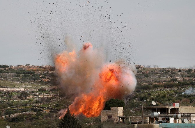 A picture taken on March 5, 2020 shows an explosion following Russian air strikes on the village of Al-Bara in the southern part of Syria's northwestern Idlib province. (File/AFP)