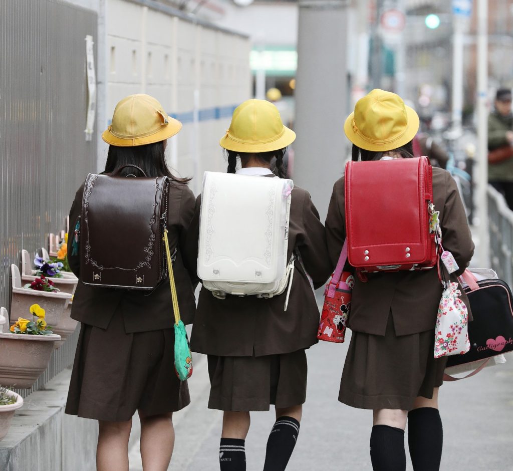 Photos of the schools' uniforms were posted on an internet forum, along with messages that