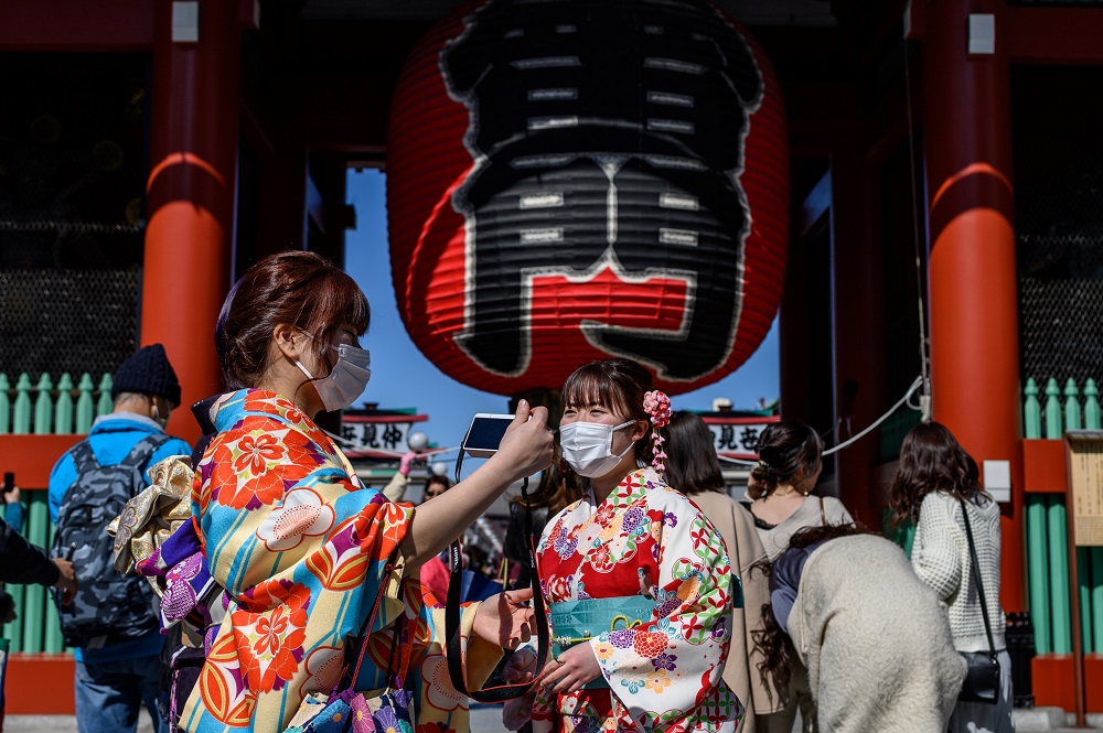 The Japanese health ministry is considering providing about 40 masks per household. (AFP/file)