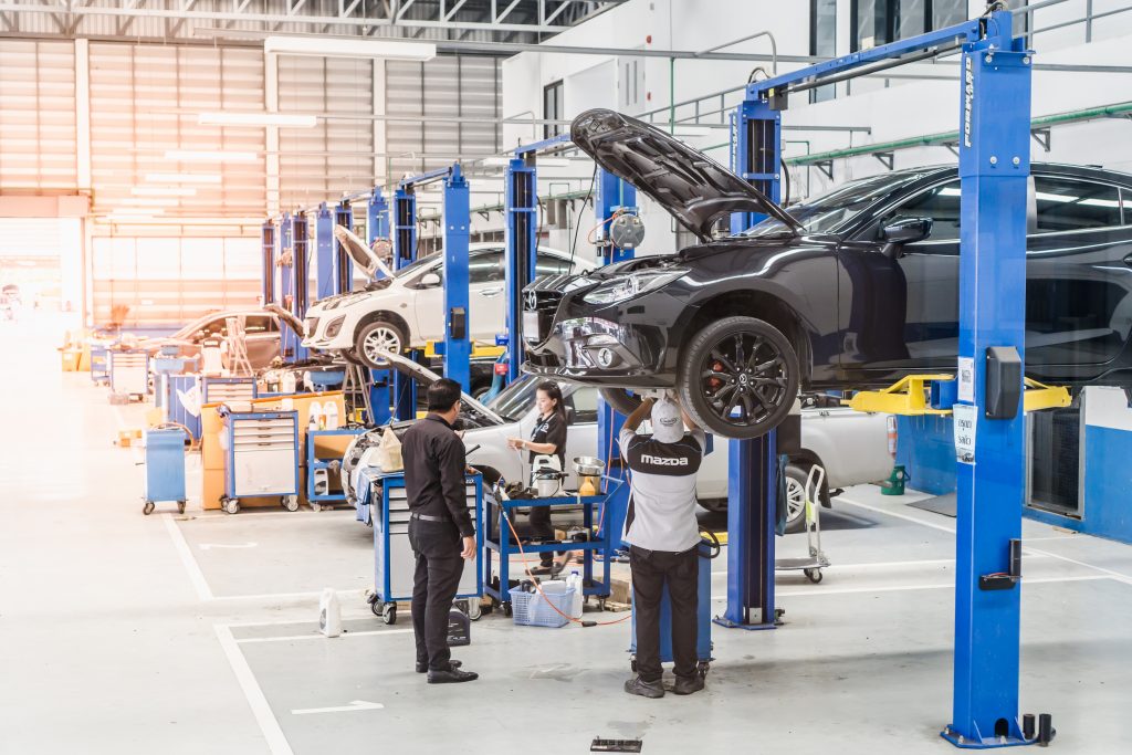 Cars are being maintained by technicians at the Mazda service center, Thanyaburi, Thailand, 14 September 2017. (Shutterstock)