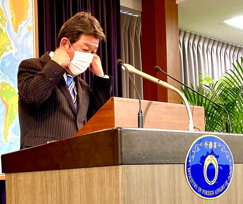 Japan’s FM Motegi adjusts his face mask before a press conference in the ministry Tuesday, March 31. (ANJP Photo)