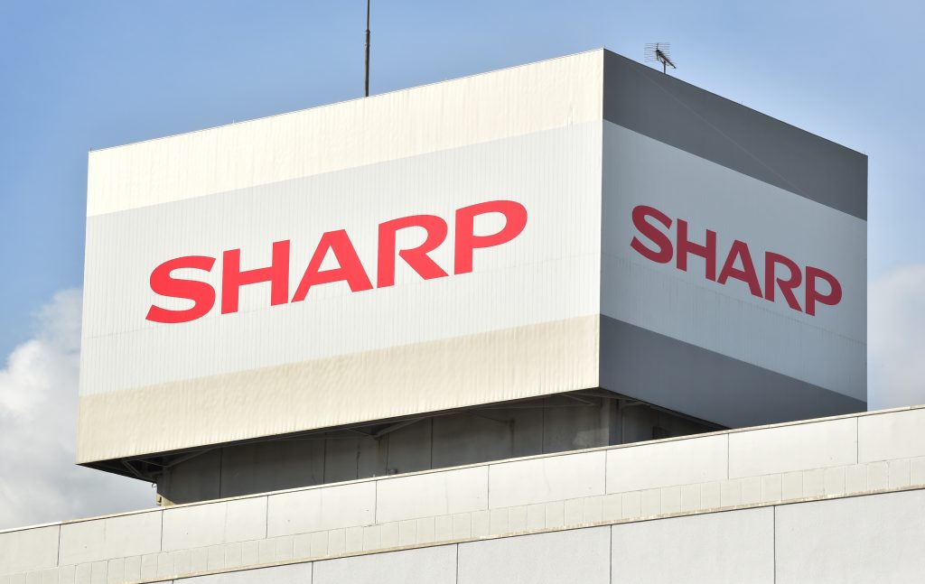 The logo of Japanese electronics giant Sharp is displayed on a roof top of the company's Tochigi Plant in Yaita, Tochigi prefecture on Nov. 19, 2015. (AFP)