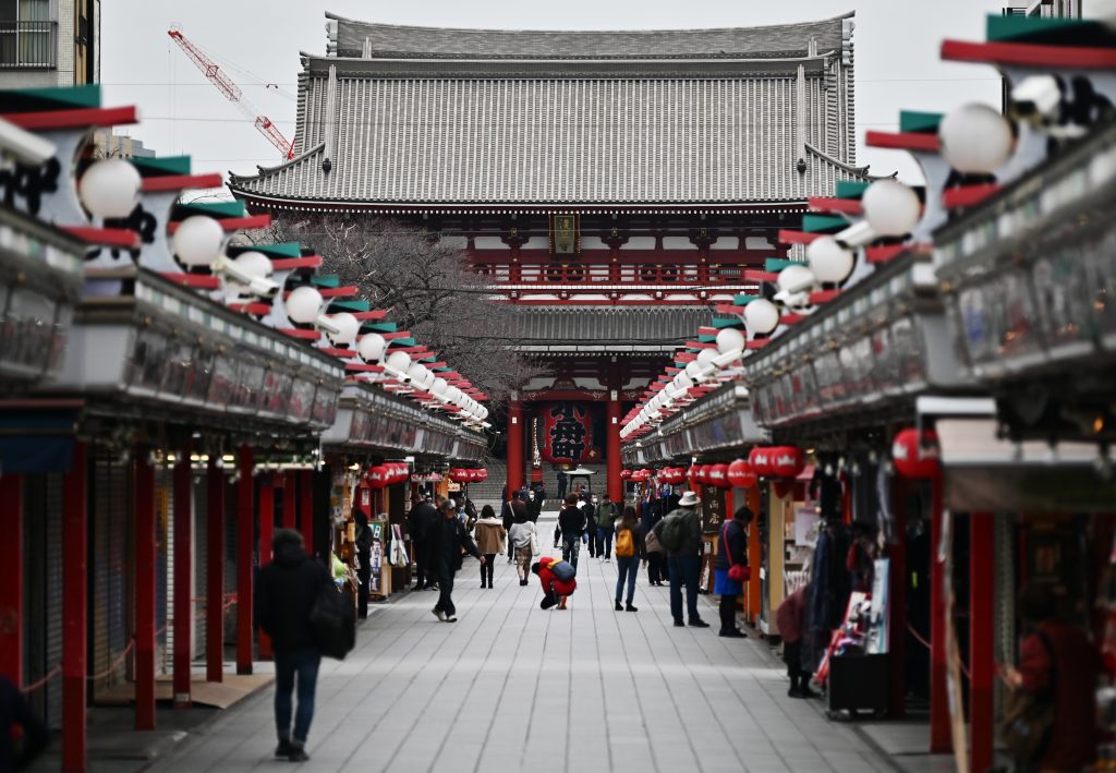 People visiting Sensoji temple in Tokyo's Asakusa district on March. 9, 2020. (AFP)   