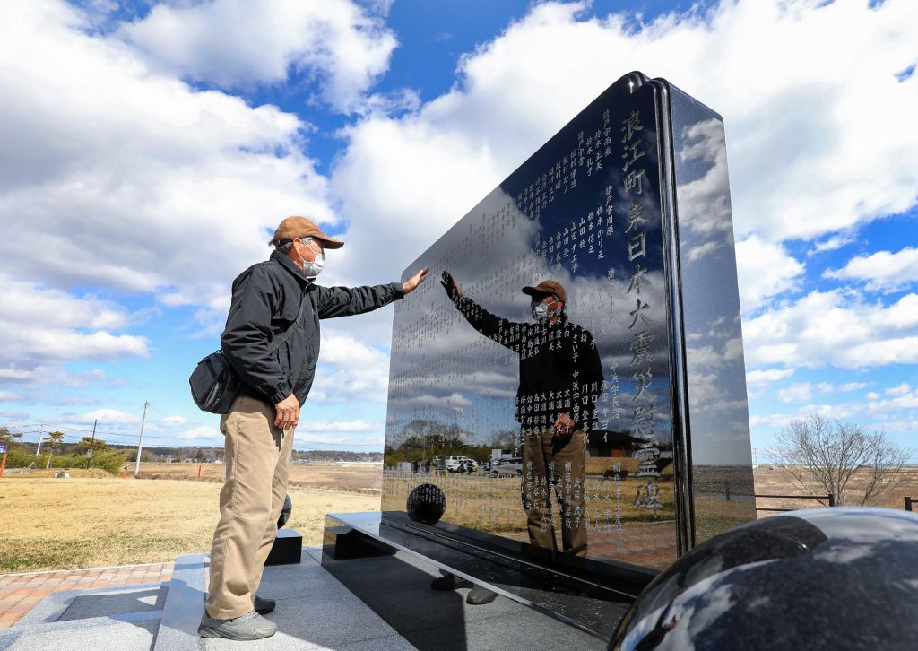 A man visits a memorial monument in Namie, Fukushima prefecture on the ninth anniversary of the 2011 tsunami disaster, March. 11, 2020. (File photo/AFP)
