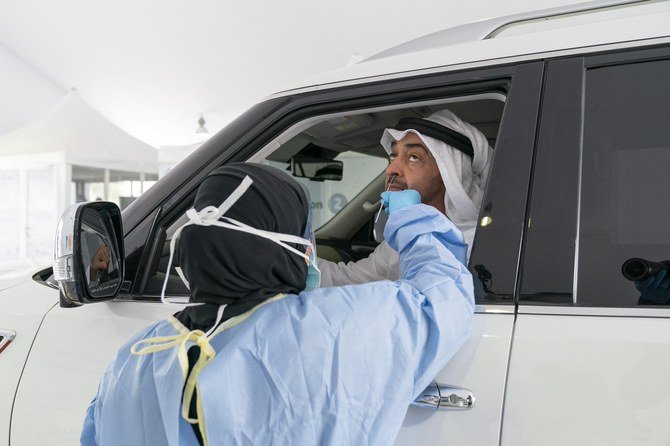 Abu Dhabi Crown Prince Mohammed bin Zayed gets tested for COVID-19 in the new drive-through testing site launched in Abu Dhabi. (Twitter/@MohamedBinZayed)