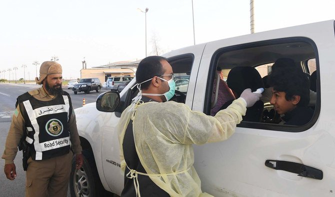 Security officers at a checkpoint at the entrance of Tabuk city. (SPA)