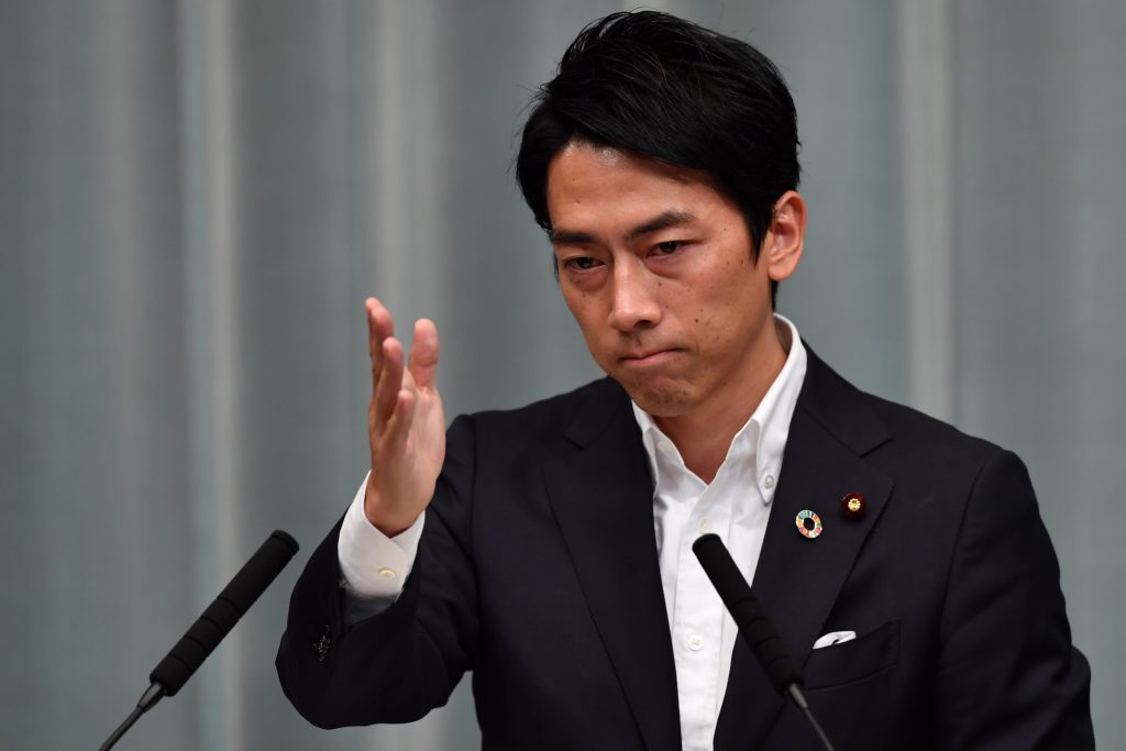 Japanese Environment Minister Shinjiro Koizumi gestures as he speaks during a press conference at the prime minister's official residence in Tokyo on Sep. 11, 2019. (AFP)