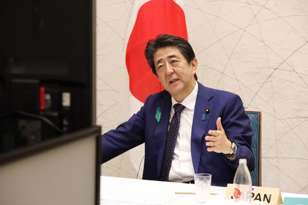 Prime Minister Shinzo Abe and Chief Cabinet Secretary Yoshihide Suga will join the virtual session together from a room in the prime minister's office. (AFP)