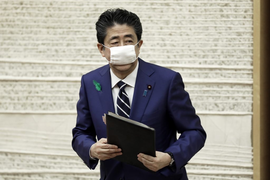 Japan's Prime Minister Shinzo Abe leaves after a press conference at the prime minister's official residence in Tokyo on April. 17, 2020. (AFP)