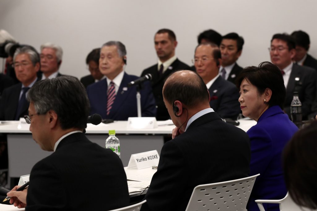 Tokyo Governor Yuriko Koike (bottom row - R) and President of Tokyo 2020 Olympics organising committee Yoshiro Mori (top row - 2nd L) in Tokyo, Dec.21, 2016. (AFP)