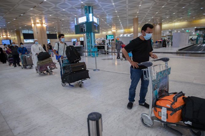 Saudi citizens arrive in the Kingdom after being transported from Indonesia on an evacuation flight on April 10, 2020. (SPA)