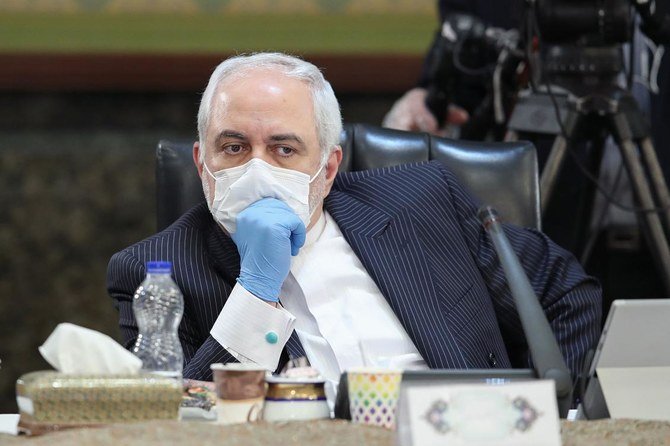 Iran’s Foreign Minister Mohammad Javad Zarif wearing a face mask during a cabinet session in the capital Tehran. (File/AFP)