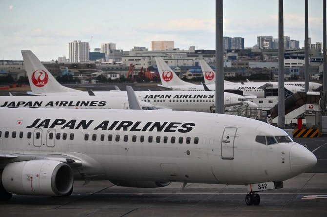 Japan Airlines also sharply revised down its operating profit forecasts to ¥100 billion from ¥140 billion. (AFP)