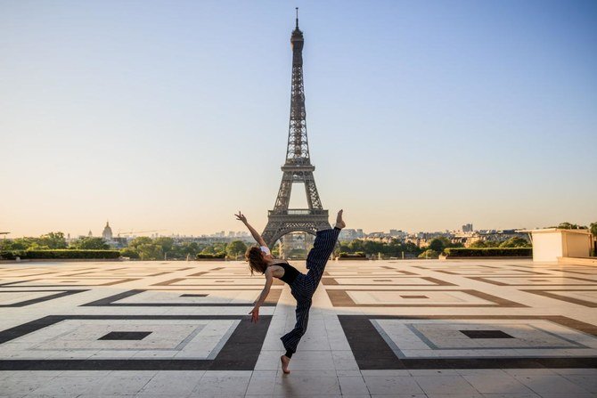 Syrian dancer and choreographer Yara Al-Hasbani performs a dance on the empty Trocadero square in front of the Eiffel tower in Paris on April 22, 2020, on the 37th day of a strict lockdown in France to stop the spread of COVID-19 (novel coronavirus). (AFP)