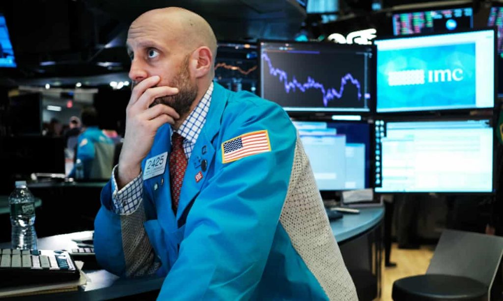 A trader on the floor of the New York Stock Exchange. (Getty Images)