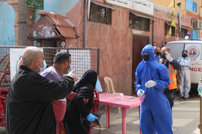 Palestinian factions impose a lockdown on the Jalil Camp for Palestinian refugees in Lebanon's eastern Bekaa Valley on April 22, 2020. (AFP)