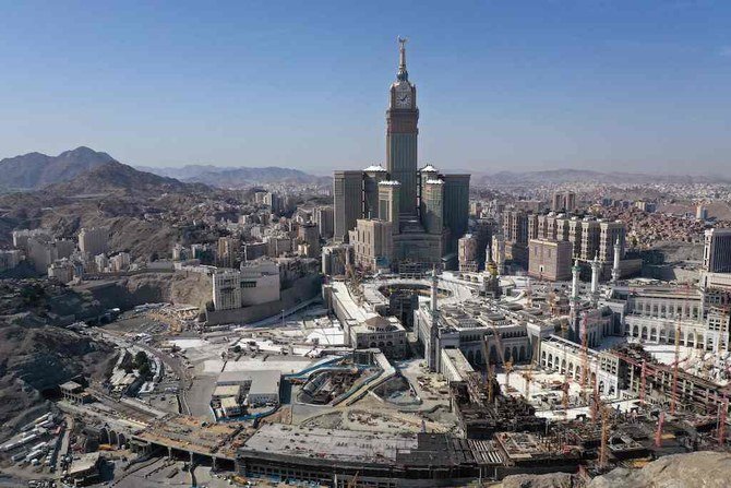 An aerial view shows the Great Mosque and the Mecca Tower and the deserted surroundings in the Saudi holy city of Mecca on April 8, 2020, during the novel coronavirus pandemic crisis. (AFP)