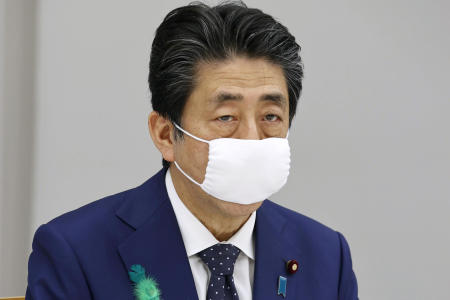 At a videoconference that the G-7 leaders held to discuss a response to the pandemic, Japanese Prime Minister Shinzo Abe called for international support to countries with a weak health care system. (AFP)