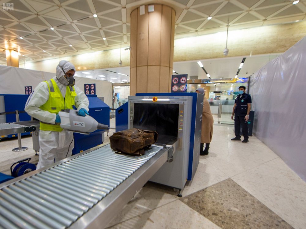 Saudis repatriated from the US are processed at the King Khalid International Airport in Riyadh early Sunday. (SPA)
