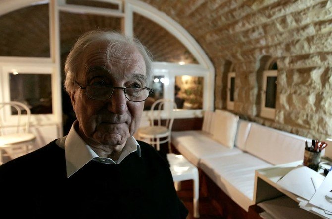 Iraqi architect Rifat Chadirji takes a night walk by the sea near his house in the coastal Lebanese town of Halat. The 