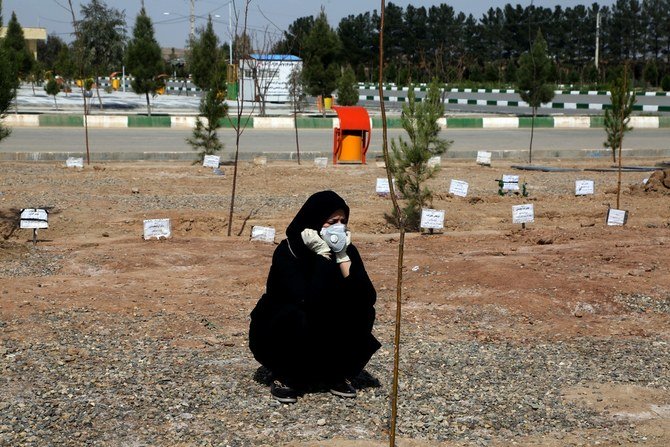 A woman mourns during a funeral held at Beheshte Masoumeh Cemetery for a victim of coronavirus in Qom, Iran, on March 17, 2020. (Getty Images)