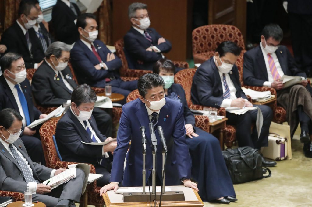Japan's Prime Minister Shinzo Abe, wearing a face mask at an upper house committee meeting at the parliament in Tokyo, April. 1  2020. (AFP)