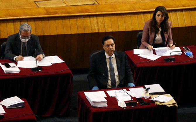 Lebanese Prime Minister Hassan Diab, center, attends a legislative session at the UNESCO Palace building in Beirut on April 21, 2020 to allow social distancing amid spread of the coronavirus. (Reuters)