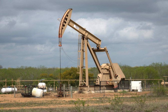 In this file photo taken on March 12, 2019 a pump jack operates at an oil extraction site in Cotulla, Texas. (AFP / Loren Elliott)