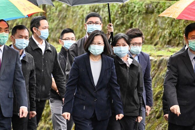 Taiwan President Tsai Ing-wen (C) arrives during a ceremony to unveil the Cyber Security Investigation Office in New Taipei City on April 24, 2020. (AFP)