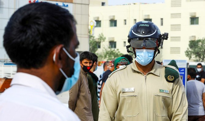 Police wear smart helmets to check workers’ temperatures amid the outbreak of the coronavirus disease (COVID-19) in Dubai. Reuters United Arab Emirates April 23, 2020. Picture taken April 23, 2020. (REUTERS)