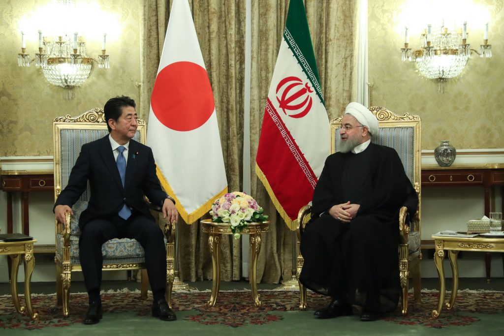 Iran President Hassan Rouhani (R) meets with Japanese Prime Minister Shinzo Abe, at the Saadabad Palace in the capital Tehran on June 12, 2019. (AFP)