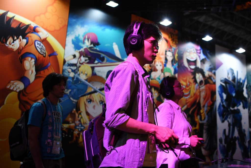 People play video games during the Tokyo Game Show in Makuhari, Chiba Prefecture on September 12, 2019. (AFP)