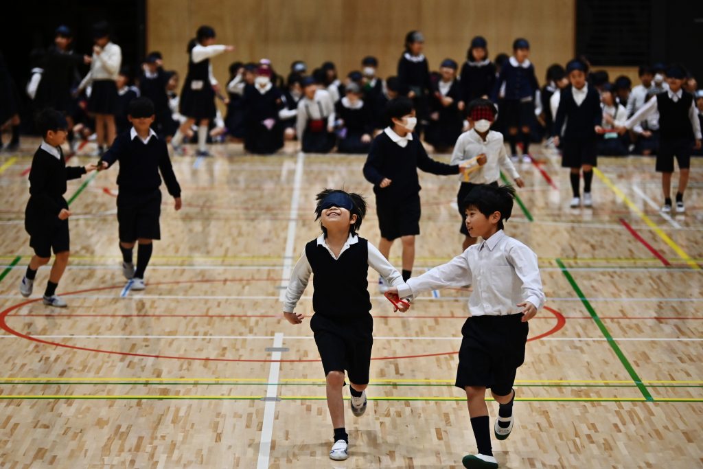 Pupils of the Ariake-nishi Gakuen elementary school take part in an exercise, Feb. 25, 2020. 